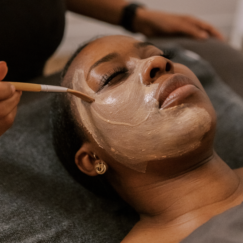 woman receiving facial